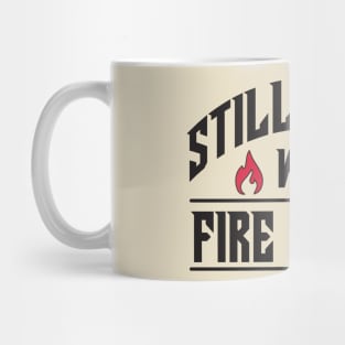 Still plays with fire trucks Mug